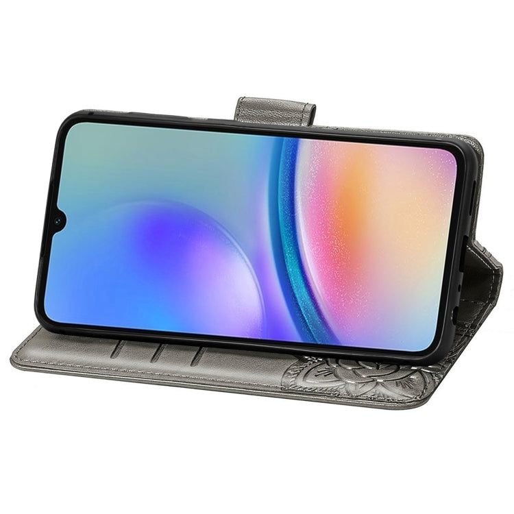BUTTERFLY Knižkové puzdro pre Samsung Galaxy A05s - sivé